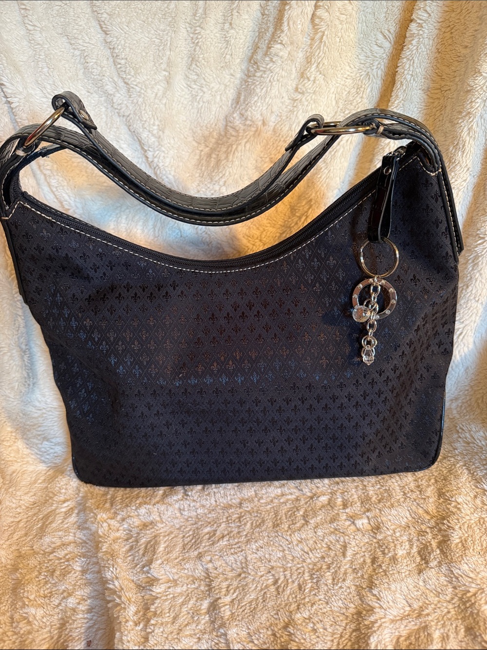 Classic Black Shoulder Bag with Silver Charm Accent